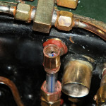 The gauge glass obstructs the top waterway