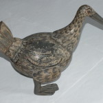 The coconut shell duck fully repaired and touched up