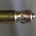 How to hold the copper pilot lights for cleaning