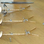 Removing the rivets to dismantle the legs